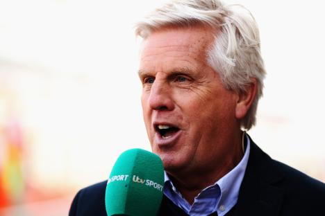 ITV presenter Steve Rider speaking into a microphone.
