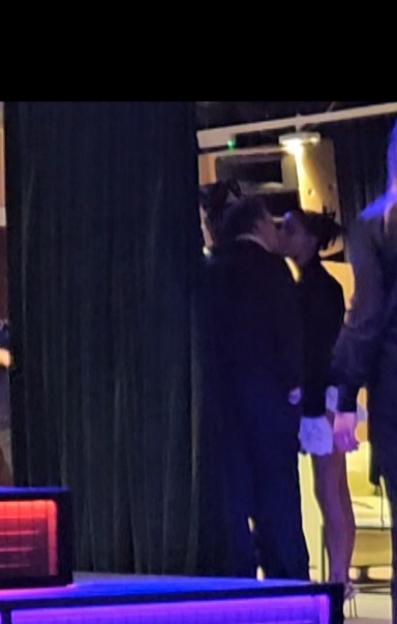 Maura Higgins and Danny Jones kissing at an after-party.