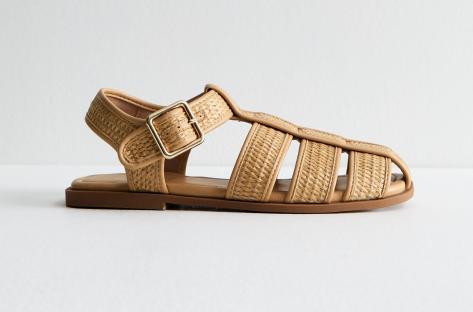 Tan woven leather sandals with buckle.