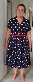 Woman in a star-print dress.