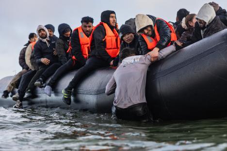 Criminal gangs are making over £200million a year smuggling people across the Channel in small boats
