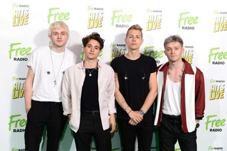 BIRMINGHAM, ENGLAND - MAY 04: (L-R) Tristan Evans, Bradley Simpson, James McVey and Connor Ball of The Vamps attend the Free Radio Hits Live at Arena Birmingham on May 04, 2019 in Birmingham, England. (Photo by Jeff Spicer/Getty Images)