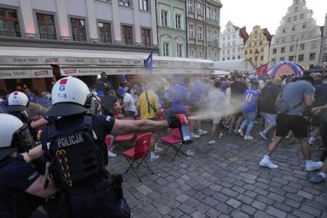 Shocking moment Chelsea fans brawl & throw glasses as violence erupts in Poland ahead of Conference League final