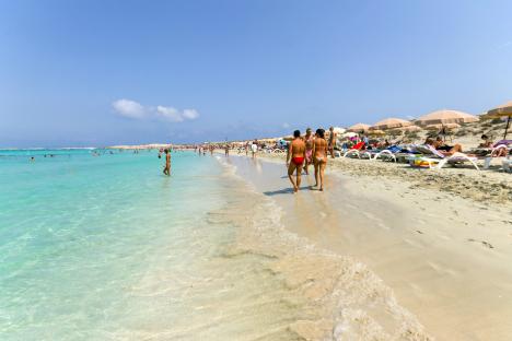 Crowded beach in Formentera, Spain.