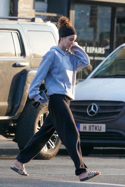 Maura Higgins walking in the street.