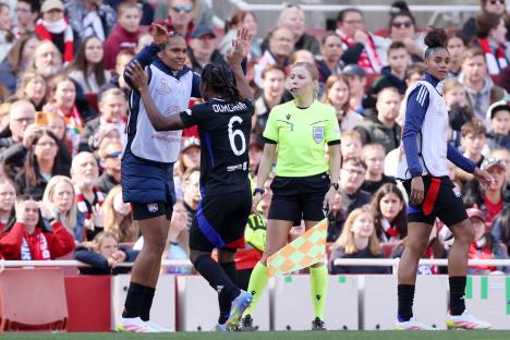 Melchie Dumornay of Olympique Lyonnais celebrates a goal during a UEFA Women's Champions League match.