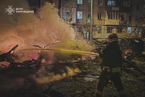 Firefighters extinguishing a fire in Kharkiv, Ukraine.
